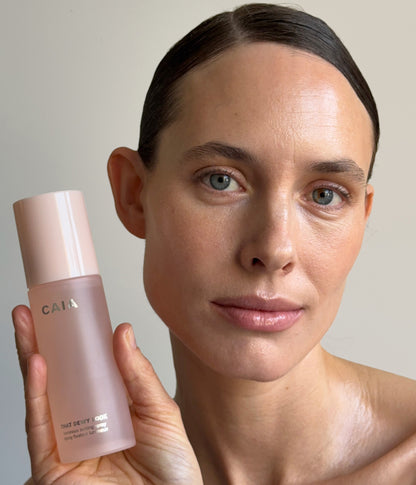 THAT DEWY LOOK LUMINOUS SETTING SPRAY – officiell produktbild från CAIA Cosmetics